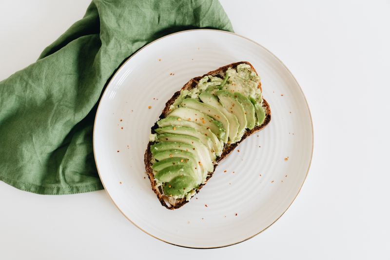 Avocado toast on sourdough with poached egg